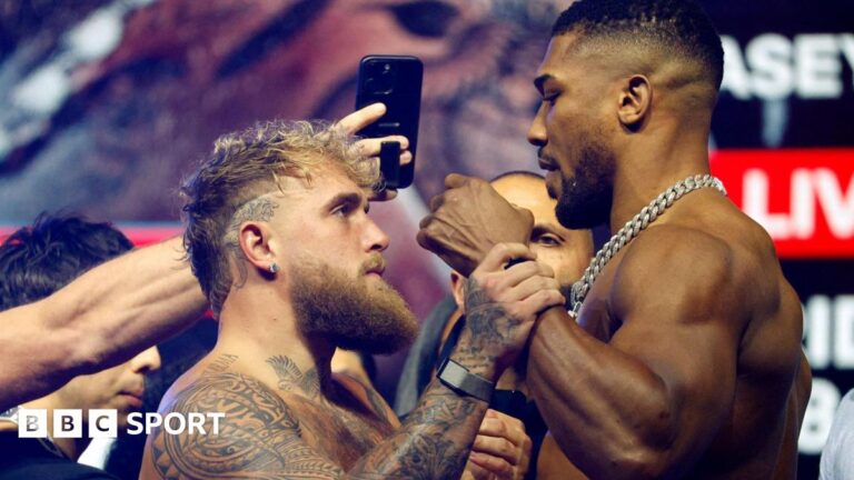 Jake Paul vs Anthony Joshua: Final face-off turns tense as AJ pushes Paul’s fist away Jake Paul grabs Anthony Joshua's fist during a face-off