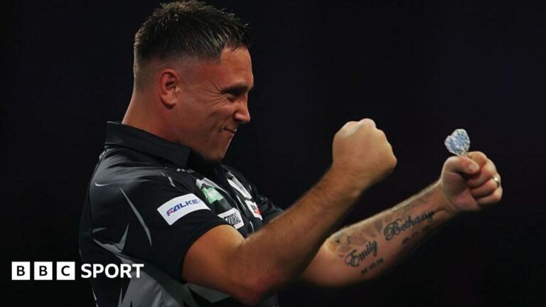 Darts player Gerwyn Price celebrates