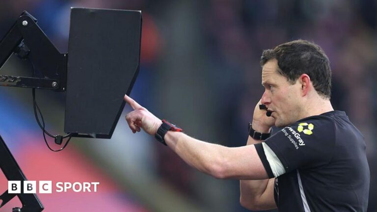 Laws of football: Wider VAR scope and more countdowns for World Cup Darren England checks the VAR monitor pitchside