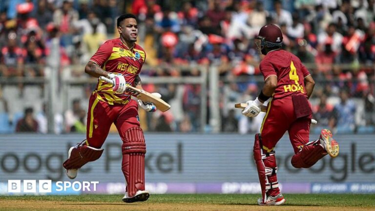 T20 World Cup: West Indies race to victory to reach Super 8s and knock out Nepal West Indies' Shimron Hetmyer (L) and captain Shai Hope (R) in action