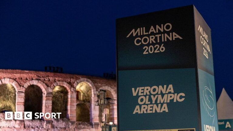 Ukraine Paralympians to boycott opening ceremony A sign for the Milano Cortina Games in front of Verona Arena - an historic stone-build venue.