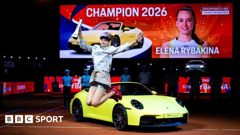 Elena Rybakina beats Karolina Muchova in Stuttgart final Elena Rybakina celebrates her victory in Stuttgart in front of the sports car that forms part of her winner's prize