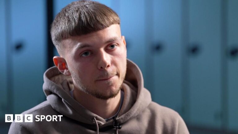Jonathan Gjoshe: Footballer in mass train attack reveals he was stabbed seven times Referee Michael Salisbury signals before he awards a second goal to Matheus Cunha of Manchester United after a VAR check