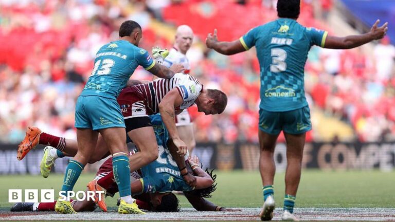 Sam Walters: Wigan Warriors forward banned for seven games Wigan Warriors player Sam Walters, in cherry and white hoops, dumps Hull Kingston Rovers player Bill Leyland on the ground head-first, in a tackle made with team-mate Junior Nsemba, partly hidden. Hull KR players Eliot Minchella and Peta Hiku look on.