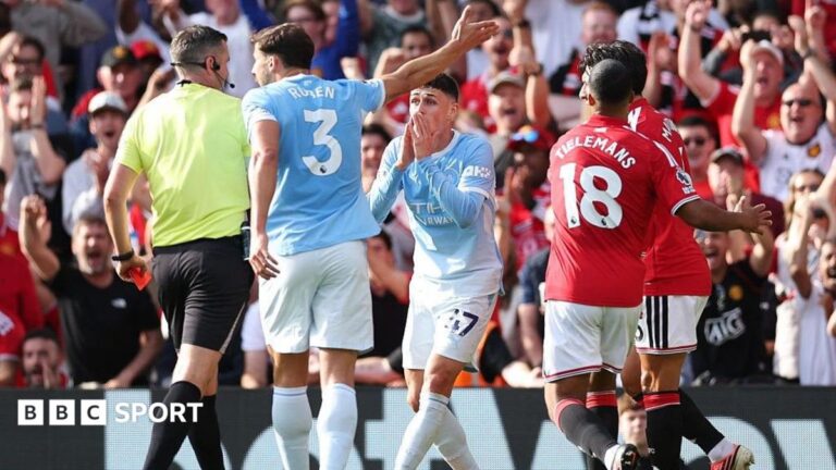 Manchester City's Phil Foden reacts after being sent off against Manchester United at Old Trafford